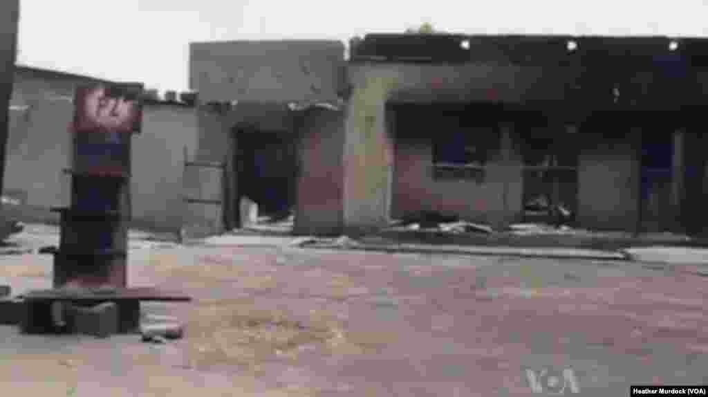 Burned buildings from a Boko Haram attack near Maiduguri, December 2013.