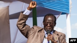 South Sudan's vice president James Wani Igga makes a speech during his visit to the Mangateen Internal Displaced persons center in Juba on Nov. 17, 2018.