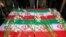 Coffins of four Iranian victims of the downing by Iran of a Ukrainian airliner are seen during the victims' funeral in Hamadan, Iran, Jan. 16, 2020.