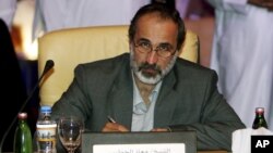 Cleric Ahmad al-Khatib was chosen in Doha, Qatar to lead newly united opposition against Syrian's president, Bashar al-Assad, November 11, 2012.