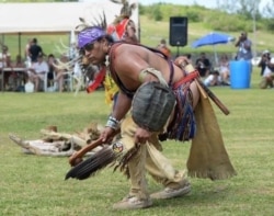 Mashpee Wampanoag Tribal Historic Preservation Officer David Weeden dances at pow wow, St. David's Island, Bermuda, June 25, 2015.