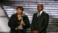 FILE - Nelson Mandela's daughter, Zindzi Mandela, and grandson, Zondwa Mandela, accept the Arthur Ashe Courage Award on Mandela's behalf during the taping of the 2009 ESPY Awards in Los Angeles, July 15, 2009.  