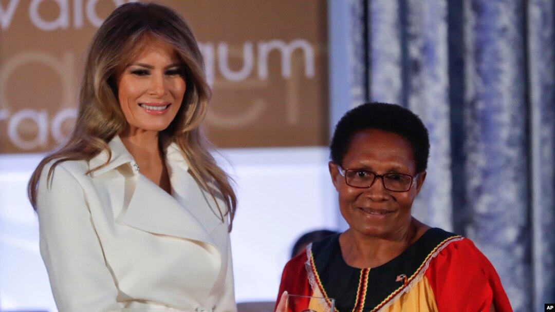 First lady Melania Trump presents the 2017 Secretary's of State's International Women of Courage (IWOC) Award to Veronica Simogun from Papua New Guinea, March 29, 2017, at the State Department in Washington.
