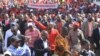 Leader of the main opposition party, Nelson Chamisa, centre, waves at supporters during a march on the streets of Harare, Wednesday, July 11, 2018. 