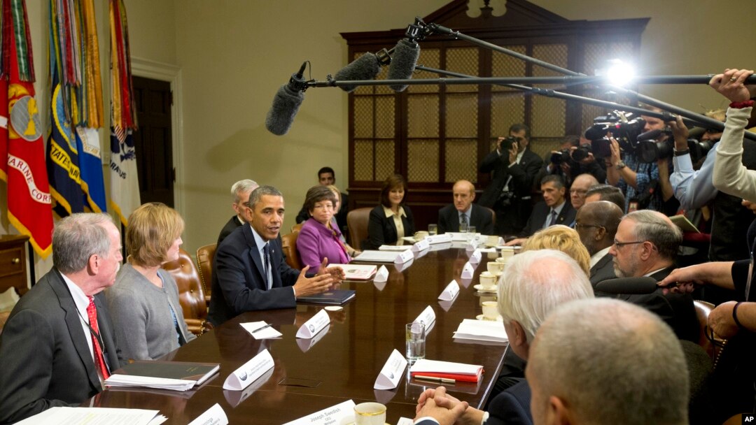 President Barack Obama makes a statement before the start of a meeting with representatives of health insurance companies, in the Roosevelt Room of the White House, in Washington, Nov. 15, 2013.