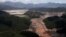General view from above of a dam owned by Vale SA and BHP Billiton Ltd. that burst, in Mariana, Brazil, Nov. 10, 2015.