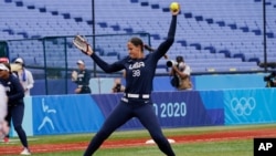 United States' Cat Osterman pitches in the sixth inning of a softball game against Japan at the 2020 Summer Olympics, July 26, 2021, in Yokohama, Japan.