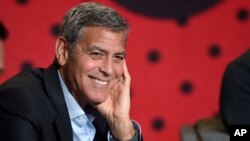 FILE - George Clooney attends a press conference for "Suburbicon" on day 4 of the Toronto International Film Festival at the TIFF Bell Lightbox, Sept. 10, 2017, in Toronto. 