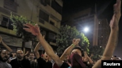 Small groups of protesters gather in central Cairo, shouting anti-government slogans in Cairo, Egypt, Sept. 21, 2019.