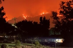 Bobcat fire approaches Sierra Madre and Arcadia communities in California, Sept. 13, 2020 in this picture obtained from social media. (John Mirabella via Reuters)