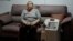 Cancer patient Linda Vidal, who relies on an electricity-powered oxygen concentrator to breathe properly, sits for an interview to talk about her physical and mental health amid the electricity cuts, in Quito, Ecuador, Oct. 24, 2024.