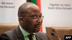 South Africa's Justice Minister Michael Masutha gives a press briefing in Pretoria on Oct. 21, 2016 regarding the country's decision to withdraw from the International Criminal Court (ICC).