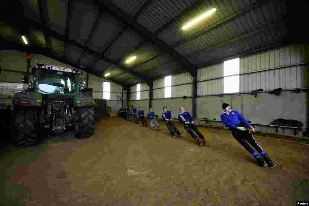 Tug of War champion and farmer James Kehoe of Boley Tug of War Club trains in his barn with teammates after being nominated as the &quot;greatest athlete of all time&quot; for the World Games awards, in County Tipperary village of Boley, Ireland, Jan. 27, 2021.