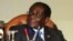 Zimbabwean President Robert Mugabe looks on during Defense Force Day Commemorations in Harare, (file photo - 10 Aug. 2010)