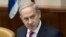 Israel's Prime Minister Benjamin Netanyahu attends the weekly cabinet meeting in Jerusalem, June 9, 2013.