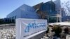 FILE - A sign marks the entrance of the Micron Technology automotive chip manufacturing plant in Manassas, Virginia, Feb. 11, 2022.