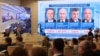 Resultados preliminares de las elecciones presidenciales de Rusia se observan en una pantalla de la Comisión Central Electoral en Moscú, el 17 de marzo de 2024.