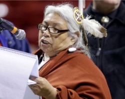 In this April 18, 2013, file photo, Faith Spotted Eagle speaks in opposition to the Keystone XL pipeline.