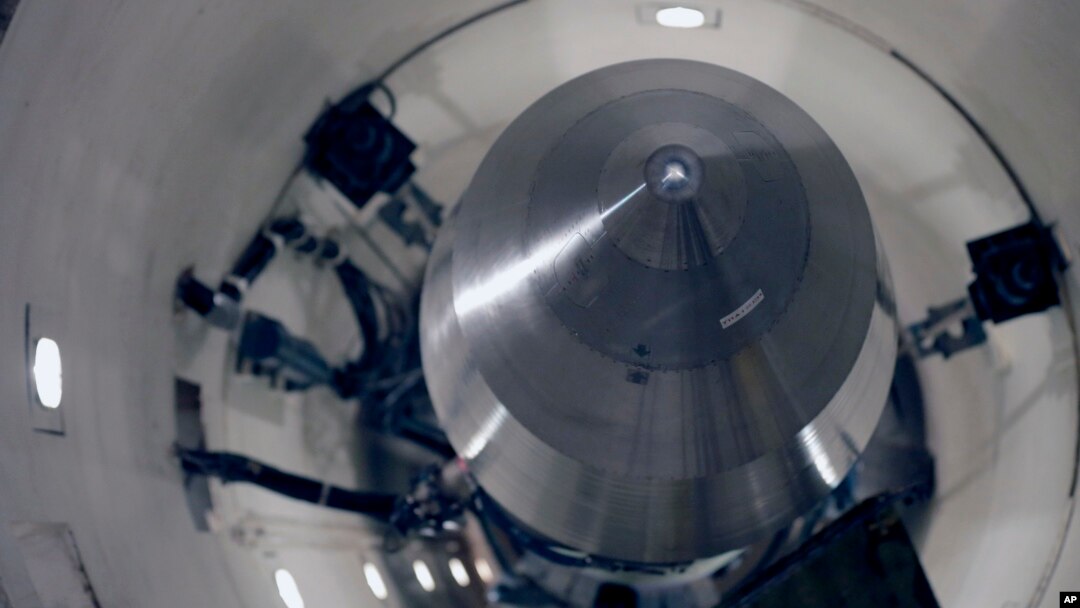 FILE - An inert Minuteman 3 missile sits in a training launch tube at Minot Air Force Base, N.D., June 25, 2014. The base is tasked with maintaining 150 of the nuclear-tipped missiles spread out across the North Dakota countryside and keeping them ready to launch.