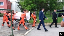 Rescue workers take Slovak Prime Minister Robert Fico, who was shot and injured, to a hospital in Banska Bystrica, Slovakia, on May 15, 2024.