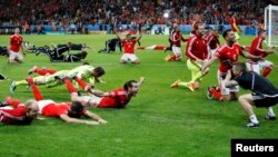 Abakinyi ba Pays De Galles bigina intsinzi inyuma yo gutsinda Ububirigi muri Quart de Final 