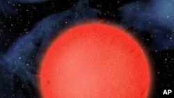 GJ1214b, shown in this artist's conception, is a super-Earth orbiting a red dwarf star 40 light-years from Earth. New observations from NASA's Hubble Space Telescope show that it is a waterworld enshrouded by a thick, steamy atmosphere.