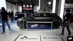 A Ioniq 5 electric car of Hyundai Motor Co. is displayed at SK Innovation Co' booth during the InterBattery 2021, the country’s leading battery exhibition, at COEX in Seoul, South Korea, Wednesday, June 9, 2021. The event kicked off on Wednesday…