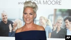 FILE - In this Monday, Sept. 16, 2013 file photo, Alecia Moore aka Pink arrives at the premiere of "Thanks for Sharing" at the ArcLight Hollywood, in Los Angeles. 