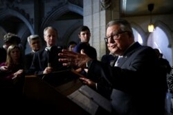 FILE - Canada's Public Safety Minister Ralph Goodale speaks during a news conference on Parliament Hill in Ottawa, Ontario, March 20, 2018.