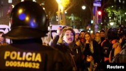 A Catalan separatist demonstrator shouts slogans during a civil disobedience protest one day ahead of Spain's general election in Barcelona, Nov. 9, 2019.