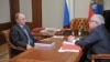 Russian President Vladimir Putin (l) and presidential human rights ombudsman Vladimir Lukin meet in the Bocharov Ruchei residence in the Black Sea resort of Sochi, March 28, 2013. 