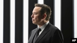 FILE - Tesla CEO Elon Musk attends the opening of a Tesla factory in Gruenheide, Germany, on March 22, 2022. Musk says that his investment in Germany gives him the right to comment on the country’s condition.