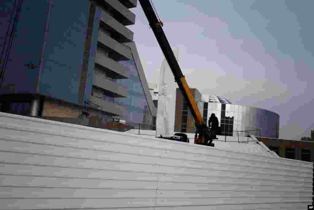 Construction is going on around a monument to Russia's first president, Boris Yeltsin, who was once Yekaterinburg's Communist boss. January 30, 2012. (VOA-Y. Weeks)