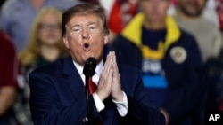 FILE - President Donald Trump speaks during a rally at the El Paso County Coliseum in El Paso, Texas, Feb. 11, 2019.