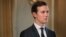 FILE - White House senior adviser Jared Kushner listens as President Donald Trump (not pictured) answers reporters' questions, at Trump National Golf Club in Bedminster, New Jersey, Aug. 11, 2017.