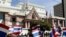 In October 2009, Thai activists wave Thai flags and chant slogans during a rally against Prime Minister Hun Sen's decision to make ousted Prime Minister Thaksin Shinawatra his economic adviser, and the recent protest may just worsen the already tense rela