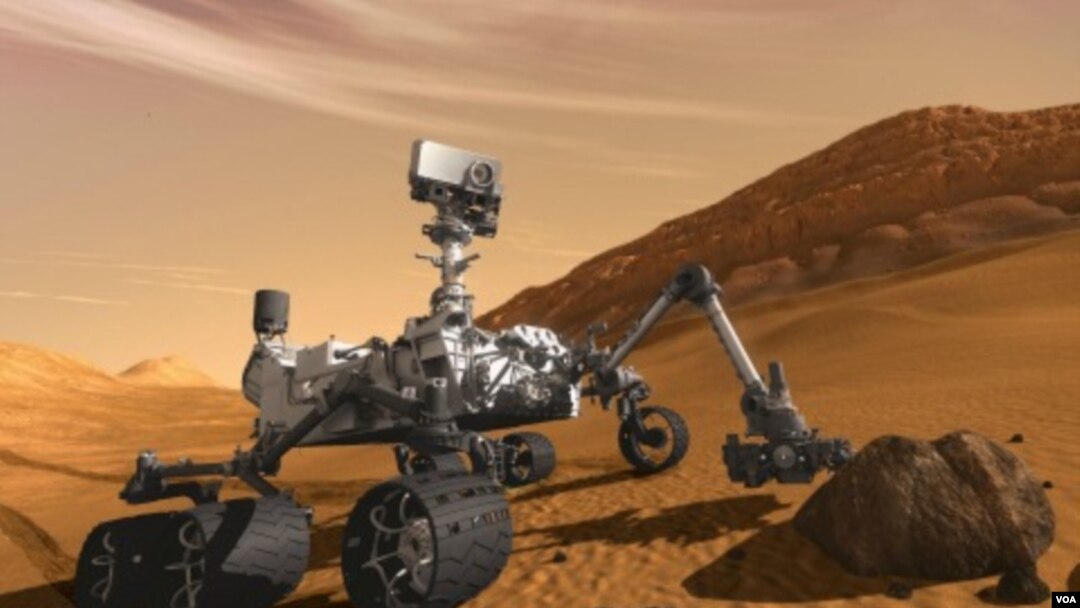 Gambar ilustrasi rover Mars milik NASA 'Curiosity' yang diperkirakan akan sampai di permukaan Mars bulan Agustus 2012.