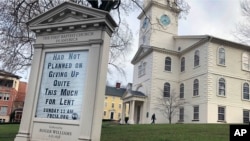 Virus Outbreak Laughter as Medicine: In this March 24, 2020, photo, a man walks past the First Baptist Church in America in Providence, R.I. 