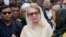 Bangladesh's former prime minister and opposition leader Khaleda Zia, center, leaves after a court appearance in Dhaka, Dec. 28, 2017.