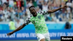 Nigeria's Ahmed Musa celebrates scoring against Iceland at the 2018 FIFA World Cup in Russia. Nigeria won that June 22 match 2-0, but was knocked out of competition by Argentina several days later. Its team jersey remains a winner. 