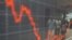 People are reflected at an index board inside the Athens stock exchange, August 9, 2011.