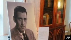 FILE - A previously unseen photo of author J.D. Salinger is displayed at the University of New Hampshire in Durham, N.H., Jan. 22, 2019.