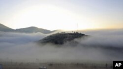 A group of Nepalese Buddhist boys are seen before they attend Bratabandha, a coming-of-age ceremony, in Kathmandu.