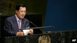 FILE - Cambodian Prime Minister Hun Sen speaks at the United Nations, Sept. 26, 2015. Expatriates are urging sanctions against his government for suppression of dissent and the jailing of opposition members and rights workers.