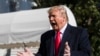 President Donald Trump speaks to reporters upon arrival at the White House in Washington, Nov. 3, 2019. 