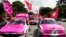 Supporters of Albania's Socialist Party in cars wave their party flags and celebrate along a street in Tirana, June 25, 2013, after counting results show a clear lead for their party. 