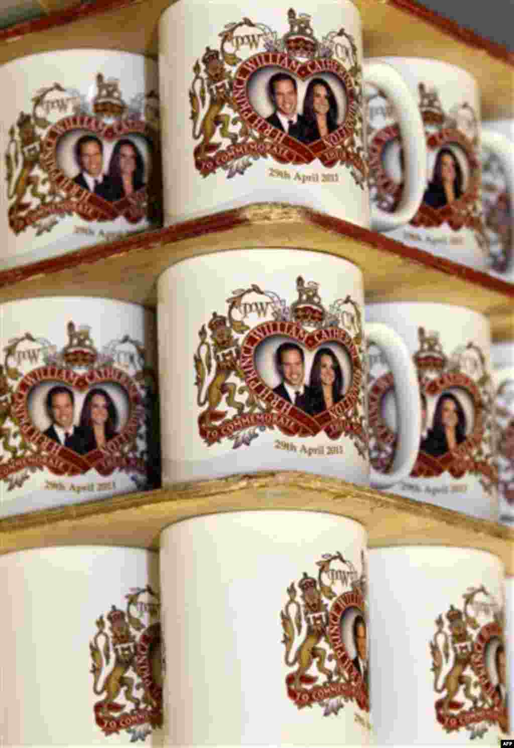 Mugs commemorating the forthcoming marriage of Britain's Prince William to Kate Middleton, are stacked at the Prince William Pottery Company in Liverpool, England, Wednesday Nov. 23, 2010. Prince William and Kate Middleton will marry April 29 in Westminst