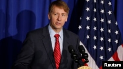 Consumer Financial Protection Bureau Director Richard Cordray speaks in Washington, Oct. 17, 2014.