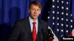 Consumer Financial Protection Bureau Director Richard Cordray speaks in Washington, Oct. 17, 2014. Cordray resigned Nov. 24, 2017, and simultaneously named his successor, setting up the consumer agency for another battle with the Trump White House over control of the powerful federal watchdog.