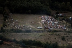 Workers prepare a grave in the cemetery where environmental activist Homero Gomez Gonzalez was to be buried in Ocampo, Michoacan state, Mexico, Jan. 30, 2020.